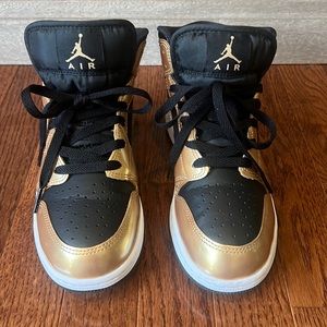 Size 7 women’s 5.5 Boys Nike Jordan Mid sneakers black and metallic gold